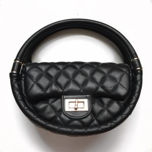 Pre-Loved Circular Quilted Bubble Handbag. Black.